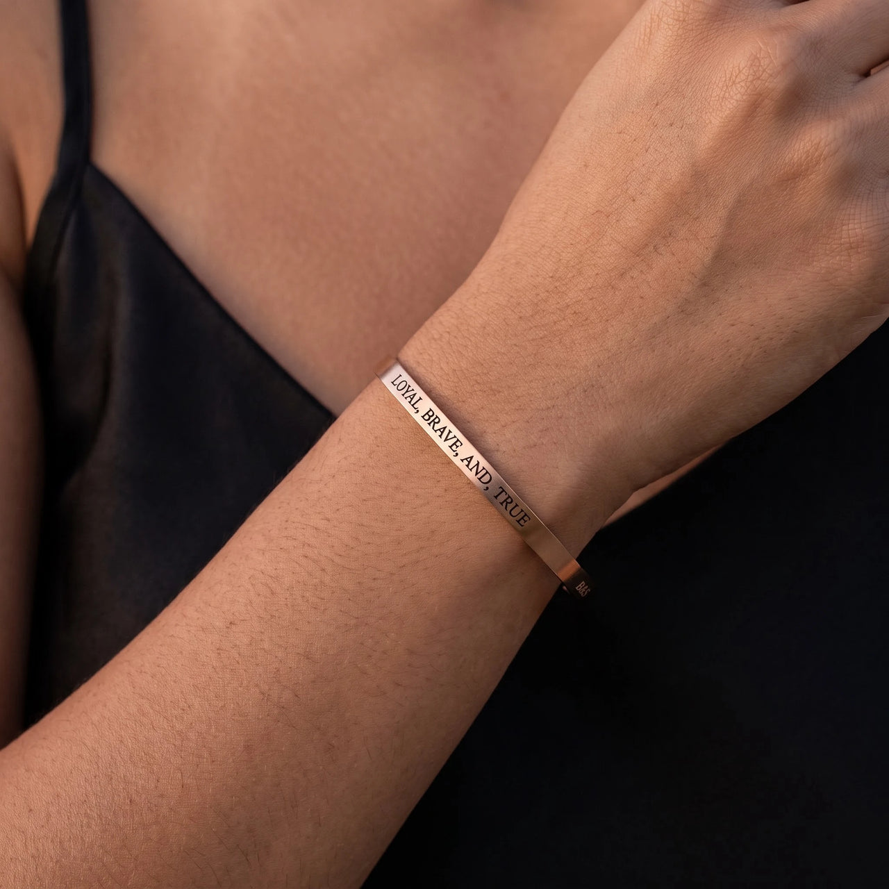 Close-up of the Loyal, Brave, And, True bracelet in rose gold worn | SKU: lbat-rg