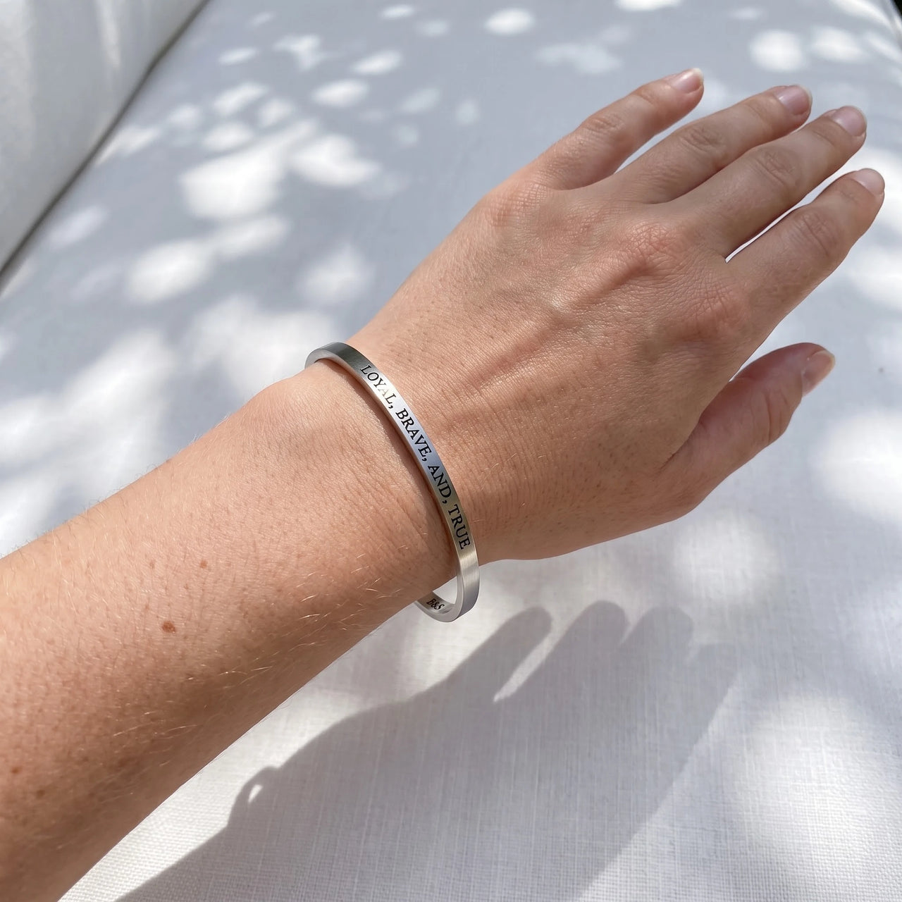 Loyal, Brave, And, True bracelet in silver worn, showing its real size | SKU: lbat-wg