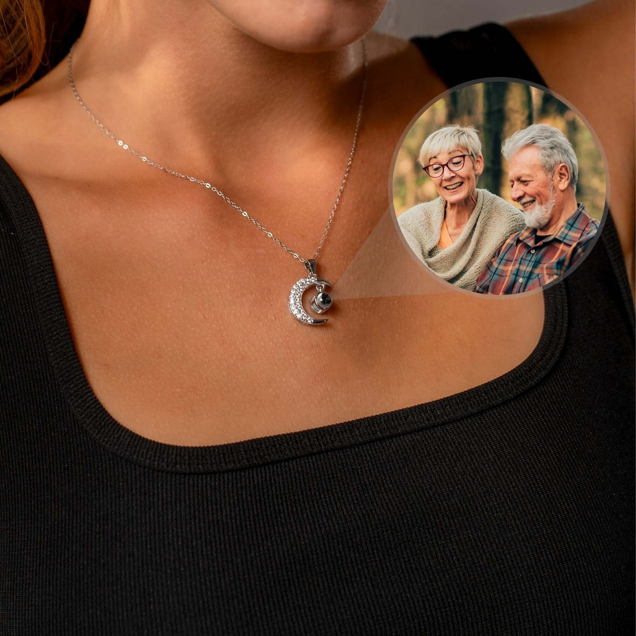 Lucky Moon Photo Necklace worn by a woman, featuring a memory projection and a photo of loved ones.