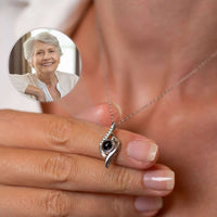Thumbnail for Luxury Photo Necklace worn by a woman, featuring a hidden photo pendant from Brother & Sisters, perfect for cherishing memories.