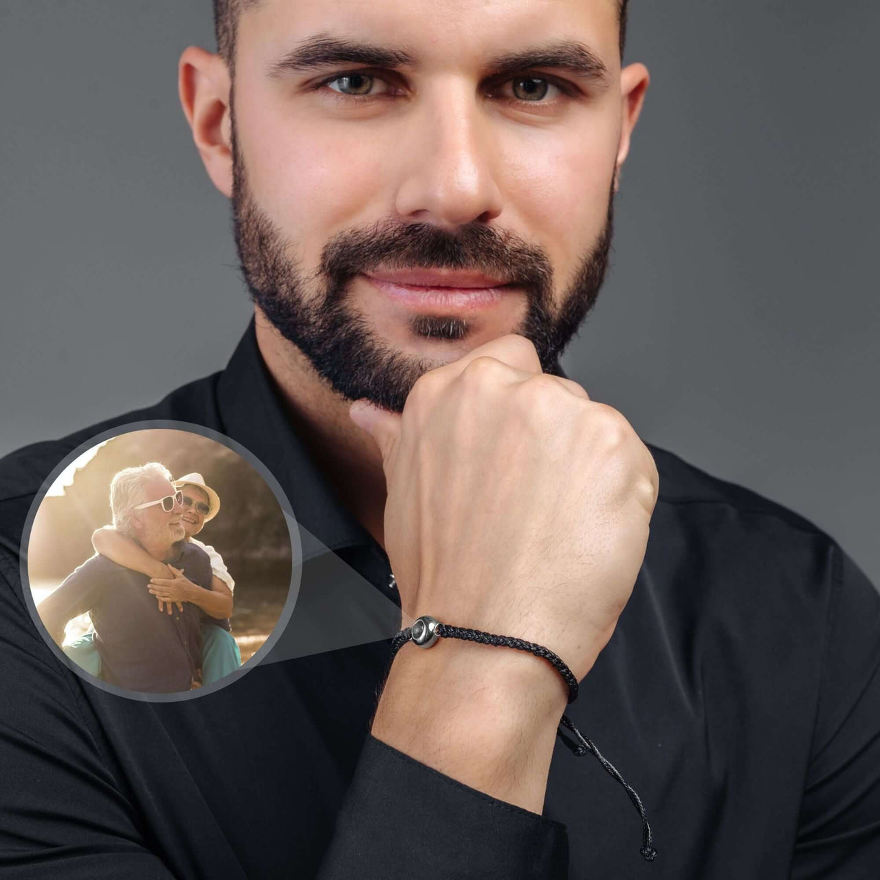 Man showcasing Classic Photo Bracelet featuring a customizable photo charm by Brother & Sisters.