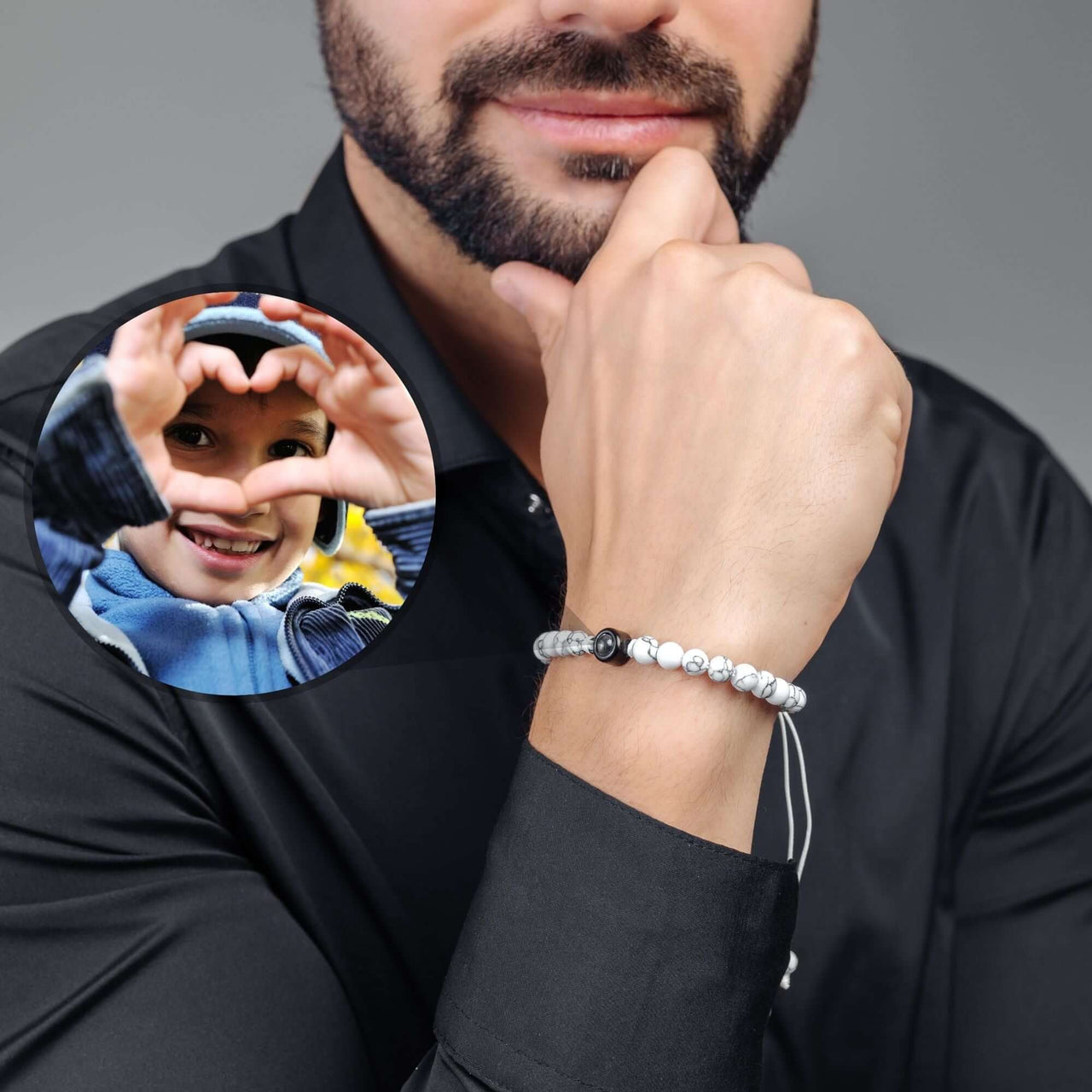 Man wearing a Minimalist Photo Bracelet by Brother & Sisters, showcasing a heartfelt photo charm.