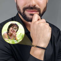 Thumbnail for Minimalist Photo Bracelet worn by a man, showcasing a personalized image of a child in a magnifier, by Brother & Sisters.