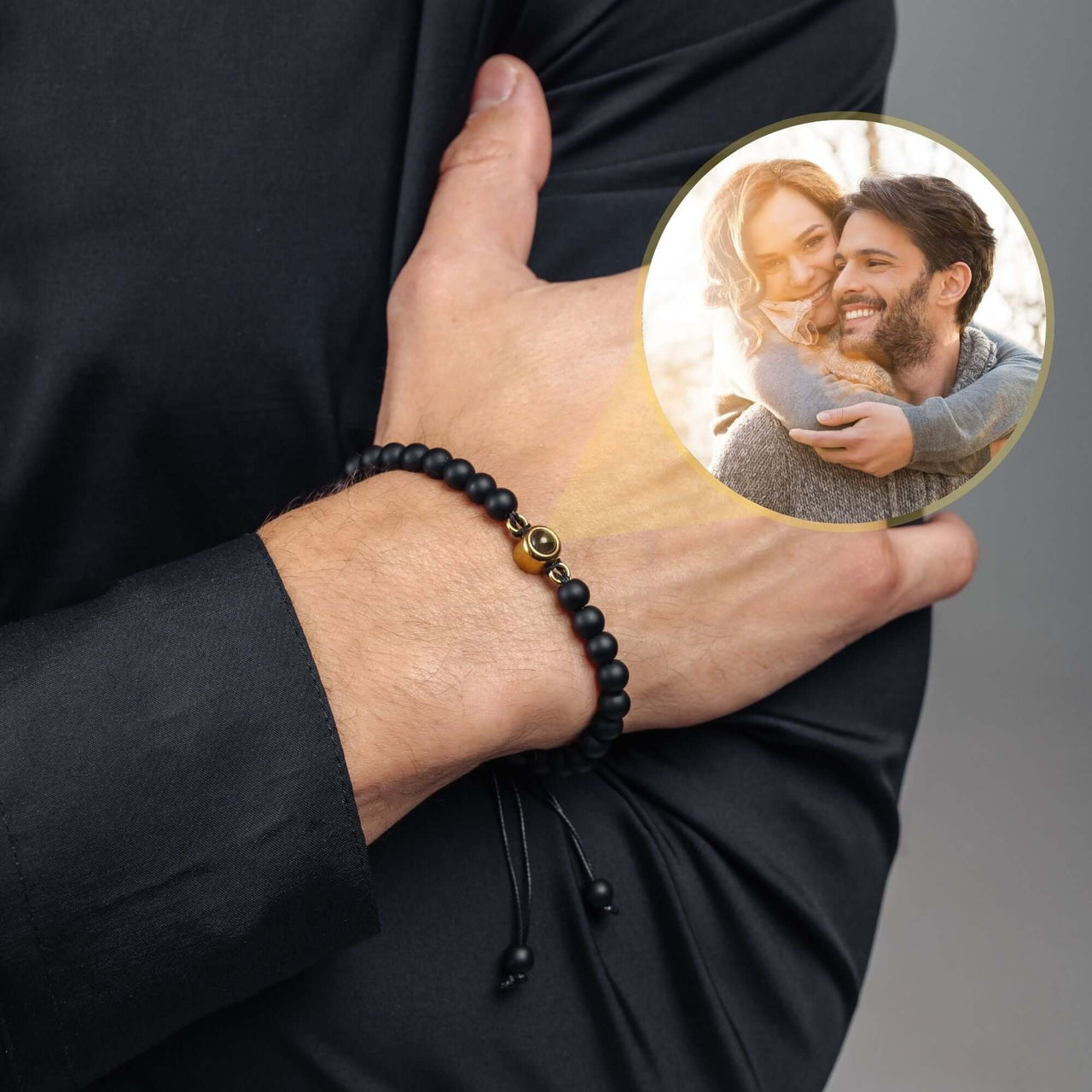 Minimalist Photo Bracelet worn on a man's wrist, showcasing handcrafted lava stones by Brother & Sisters, symbolizing cherished moments.