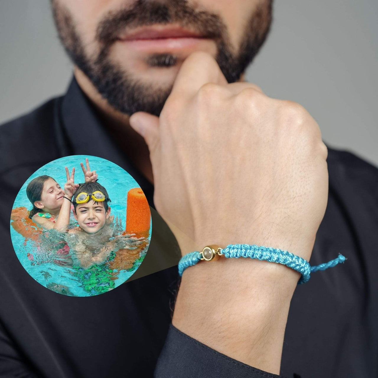 Man Blue Photo Bracelet showcasing a personalized photo of fun swimming memories by Brother & Sisters.