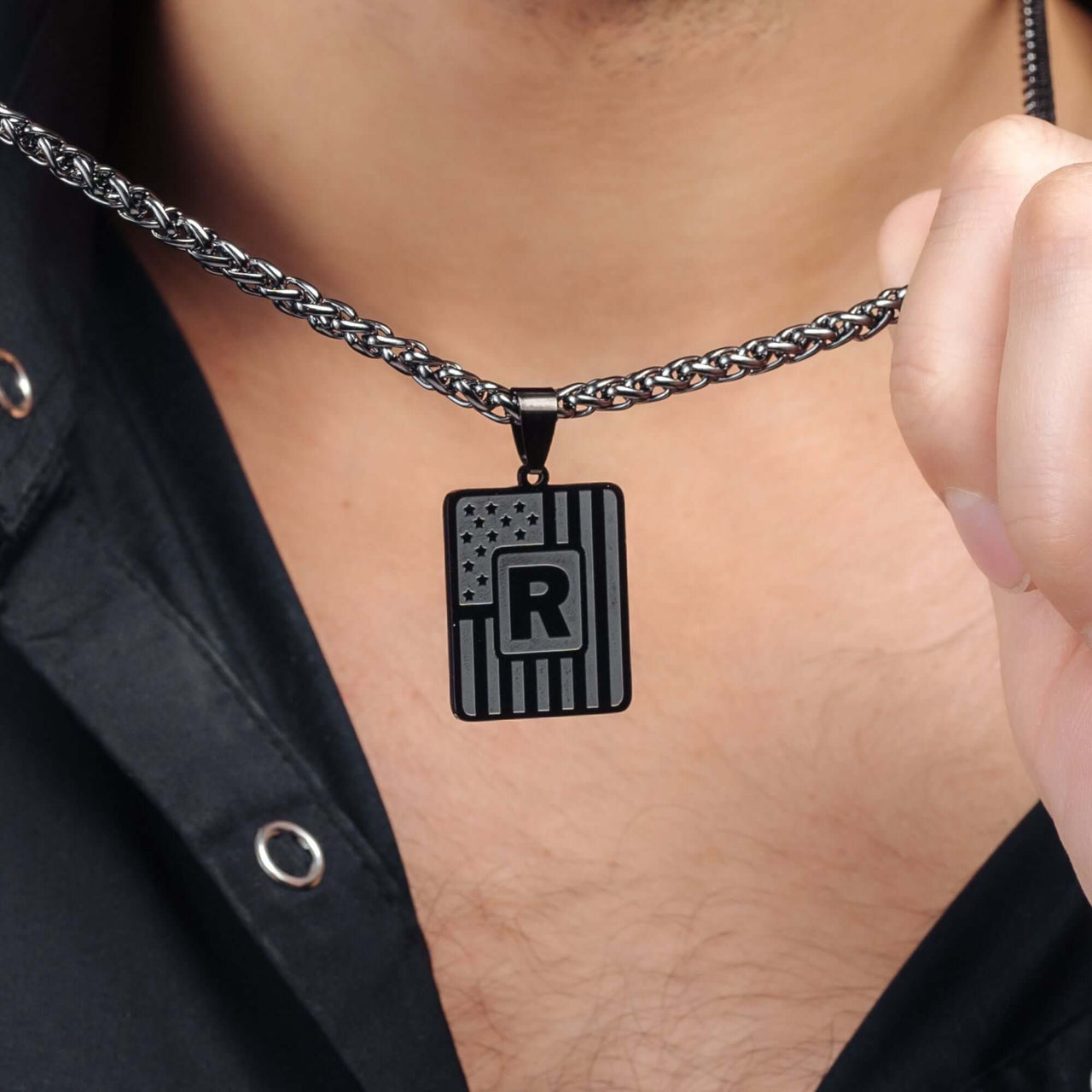 Military Initial Necklace by Brother & Sisters featuring a rugged letter pendant with military-inspired design.