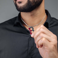 Thumbnail for Man holding Silver Rugby Initial Necklace with letter 'B', a bold personalized men's necklace by Brother & Sisters.