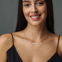Thumbnail for Minimalist Name Necklace worn by a woman, featuring the name 'Camila' in an elegant design by Brother & Sisters.
