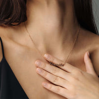 Thumbnail for Minimalist Name Necklace by Brother & Sisters displayed elegantly on model, featuring the name 'Camila' in sleek, gold design.