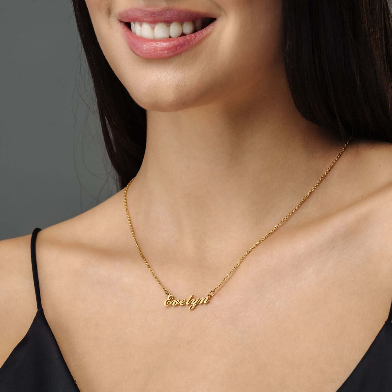 Minimalist Name Necklace worn by a woman, showcasing the elegant and personalised design by Brother & Sisters.