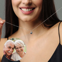 Thumbnail for Moonlight Photo Necklace worn by a woman, featuring a moon-shaped pendant holding a personal photo, by Brother & Sisters.