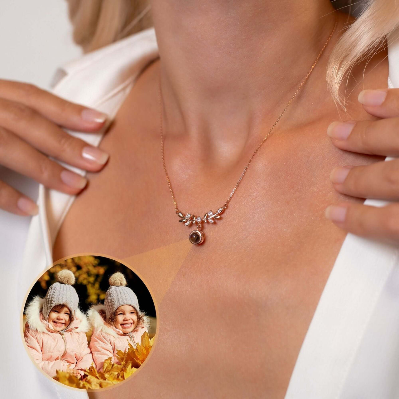 Nature Photo Necklace by Brother & Sisters projecting a special photo on a surface, capturing cherished memories.