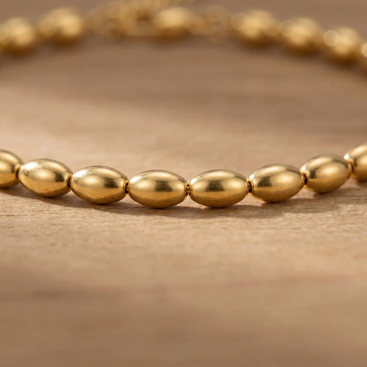 Oval Bead Anklet featuring tiny gold beads with a smooth, tactile finish by Brother & Sisters.