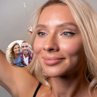 Thumbnail for Model wearing a Padlock Photo Necklace from Brother & Sisters, showcasing a personalized photo charm.