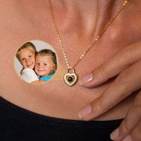 Thumbnail for Padlock Photo Necklace featuring a heart-shaped locket and a picture of loved ones, by Brother & Sisters.