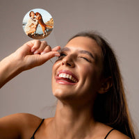 Thumbnail for Woman showcasing the Paw Print Photo Necklace, revealing a cherished photo projection of her pet.