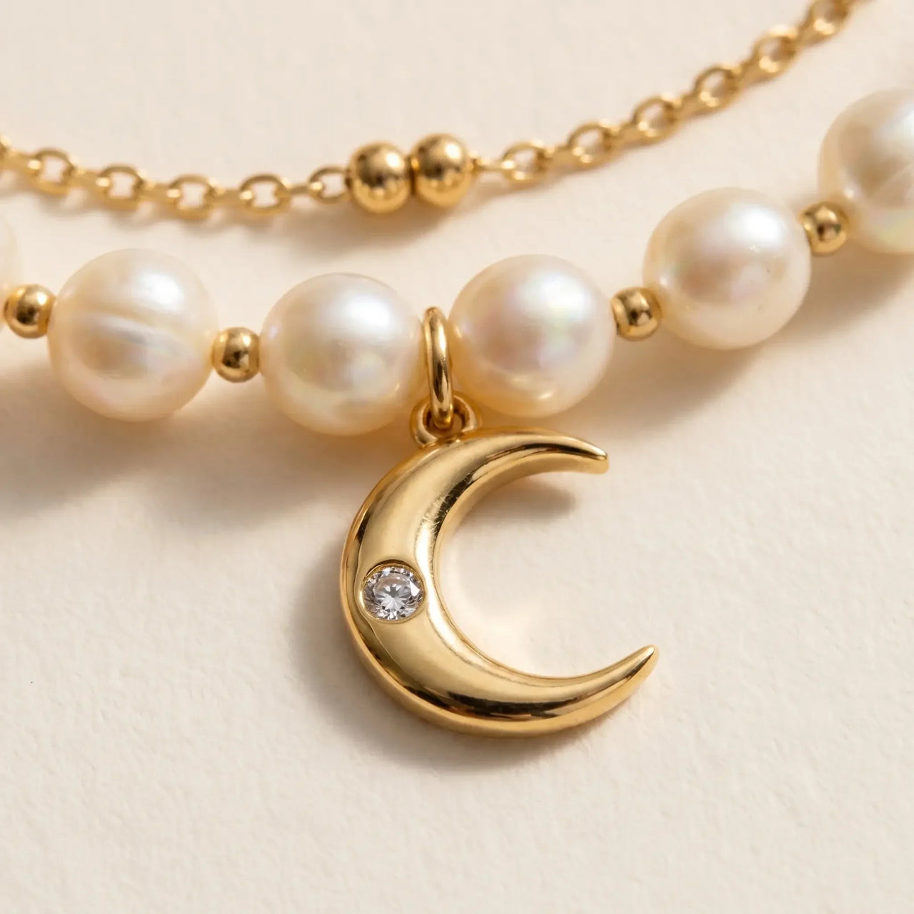 Pearl Moon Anklet Set featuring gold crescent moon charm and cream freshwater pearls, perfect for a subtle luxurious touch by Brother & Sisters.