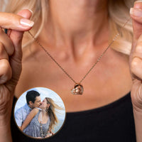 Thumbnail for Woman holding Precious Heart Photo Necklace with customizable photo insert by Brother & Sisters.