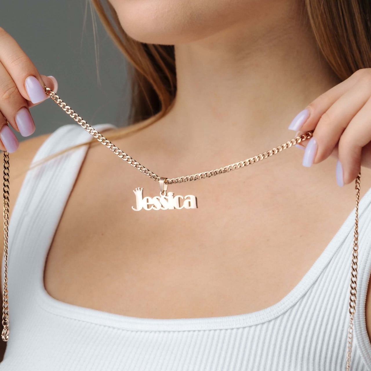 Custom Queen Name Necklace by Brother & Sisters featuring personalized name pendant in gold, worn elegantly.