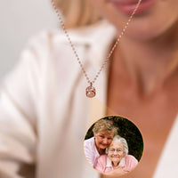 Thumbnail for Rare Photo Necklace showcasing a custom photo projection feature by Brother & Sisters, highlighting a cherished moment.