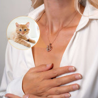 Thumbnail for Romance Photo Necklace worn by a woman showcasing a heart pendant with a photo of a cat, by Brother & Sisters.