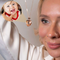 Thumbnail for Romance Photo Necklace showcasing a heart pendant with a photo projection, designed by Brother & Sisters.