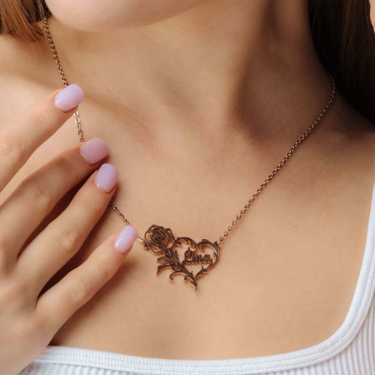 Rose Name Necklace by Brother & Sisters, featuring a rose design in elegant rose gold, perfect for personalized style.