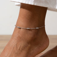 Thumbnail for Silver Bead Anklet featuring delicate polished silver beads, perfect for summer afternoons, by Brother & Sisters.