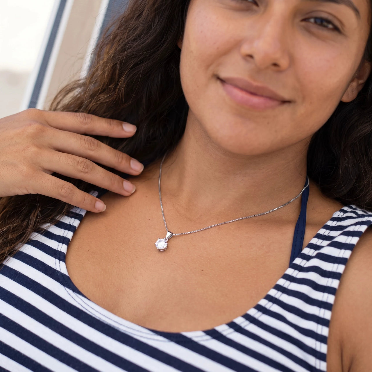 Woman relaxing on holiday wearing the silver necklace | SKU: 505665