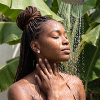 Thumbnail for Silver stud earrings worn under a tropical outdoor shower | SKU: 505174