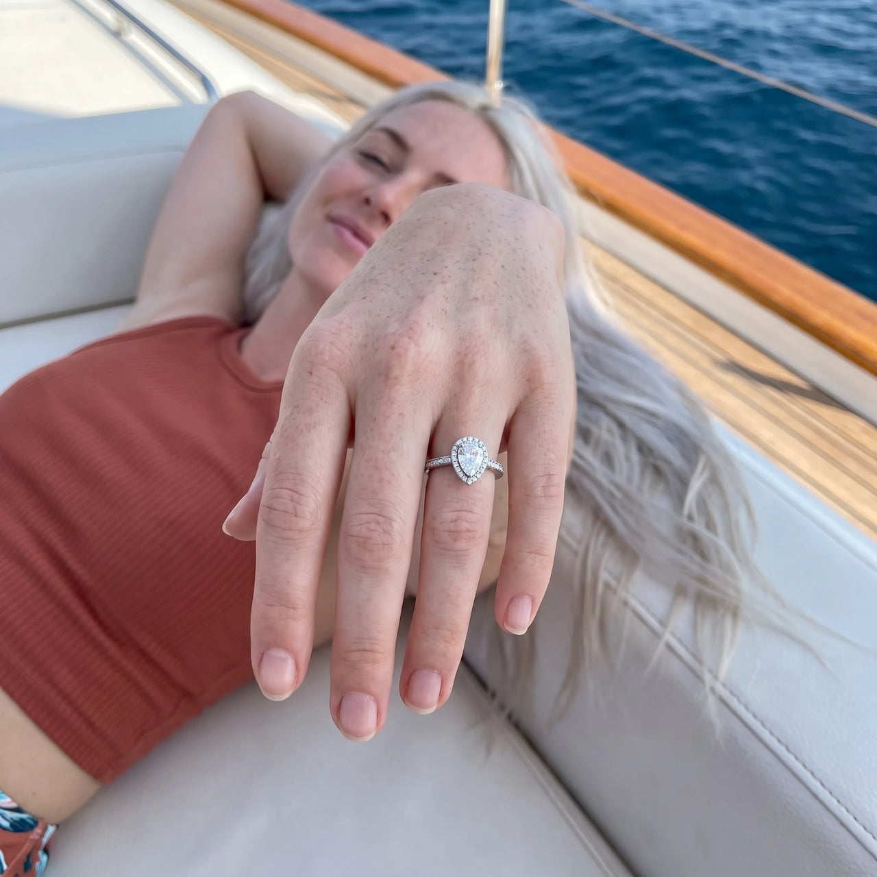 Woman relaxing on holiday wearing the silver ring | SKU: 505162-4.5-silver