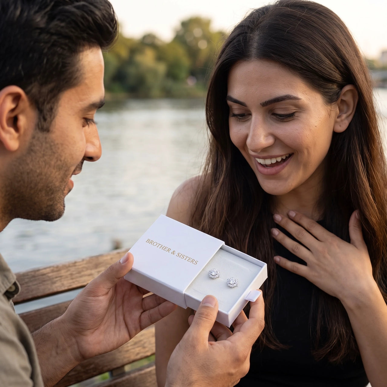 He surprises her with the silver ring in its gift box | SKU: 30876249