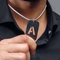 Thumbnail for Army Initial Necklace worn by a man showcasing personalized silver design by Brother & Sisters.