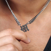 Thumbnail for Fire Initial Necklace by Brother & Sisters, showcasing a bold silver chain with personalized initial detail.