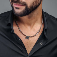 Thumbnail for Fire Initial Necklace worn by a man, showcasing its bold silver chain and personalized initial design by Brother & Sisters.