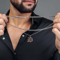 Thumbnail for Man wearing Silver Unique Initial Necklace by Brother & Sisters, showcasing personalized jewelry style.