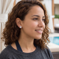 Thumbnail for Woman relaxing on holiday wearing the silver stud earrings | SKU: 22683128