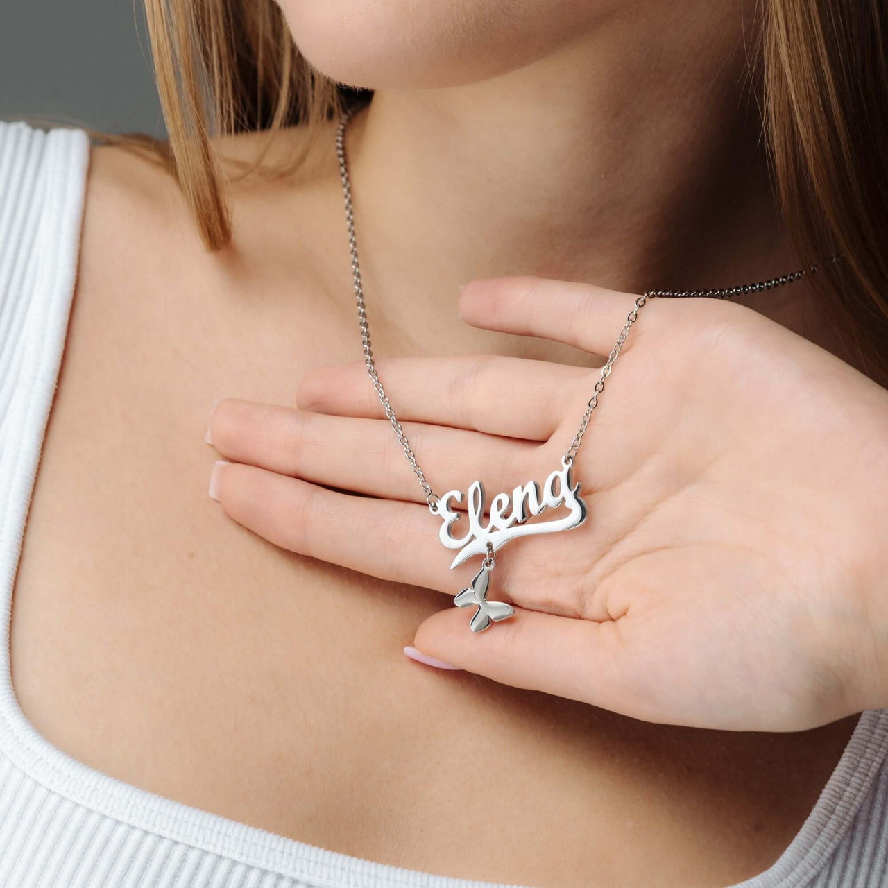 Simple Name Necklace by Brother & Sisters, featuring a personalised name 'Elena' in elegant silver design.