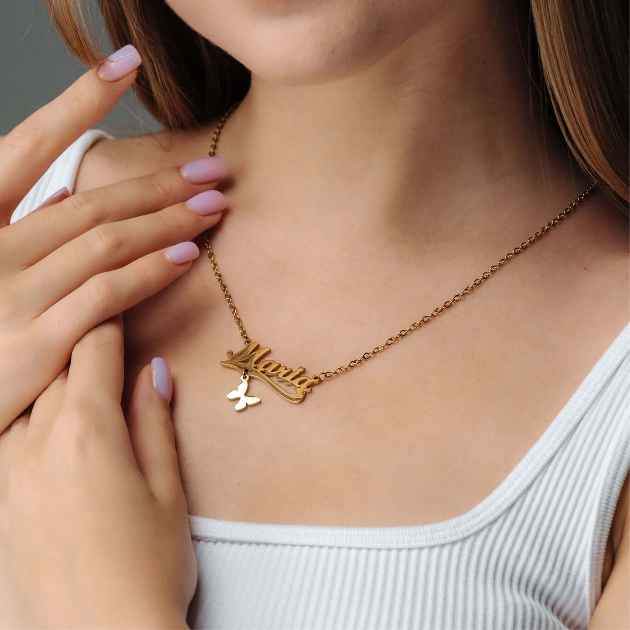 Simple Name Necklace by Brother & Sisters showcasing a personalised name pendant on a delicate gold chain.