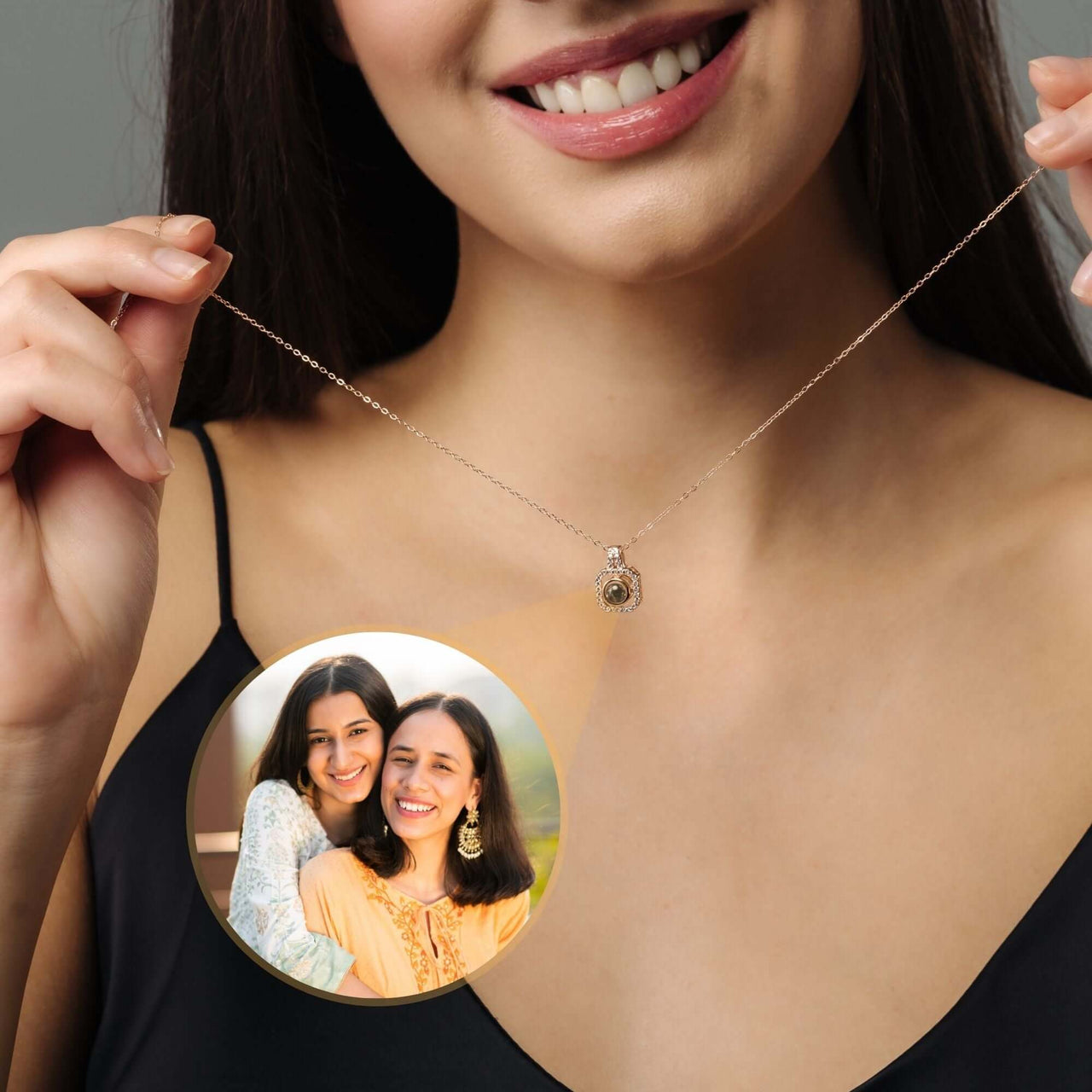 Woman wearing a Square Photo Necklace with a personalized photo charm, designed by Brother & Sisters.