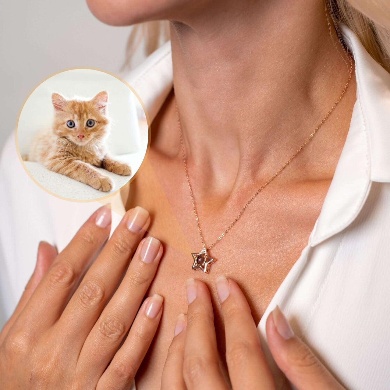Star Photo Necklace worn by a woman, personalized keepsake projecting a cat photo, from Brother & Sisters.