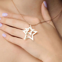Thumbnail for Stars Name Necklace by Brother & Sisters featuring a personalised design with names Paul and Elena in elegant star shapes.