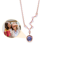 Thumbnail for Stars Photo Necklace by Brother & Sisters featuring a hidden photo projection and a rose gold design.