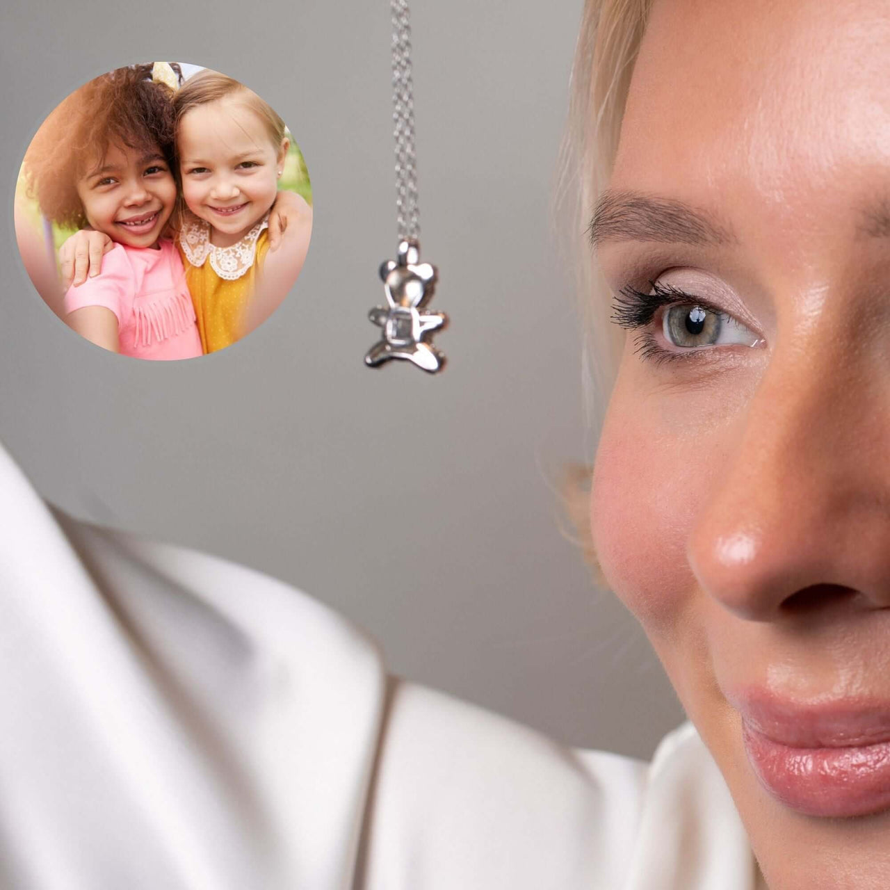 Teddy Bear Photo Necklace worn by a woman, showcasing a projection of cherished memories with kids in the pendant.