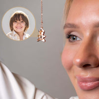 Thumbnail for Teddy Bear Photo Necklace showcasing a sentimental projection feature with a close-up of a woman and a child's photo.