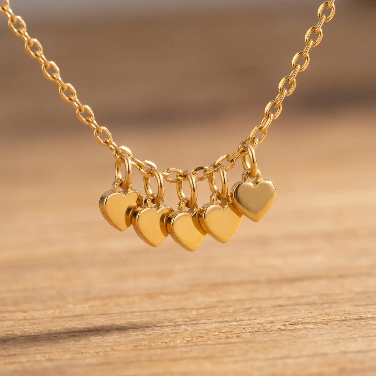 Tiny Heart Drop Anklet with five delicate heart drops, ultra-dainty gold chain from Brother & Sisters brand.