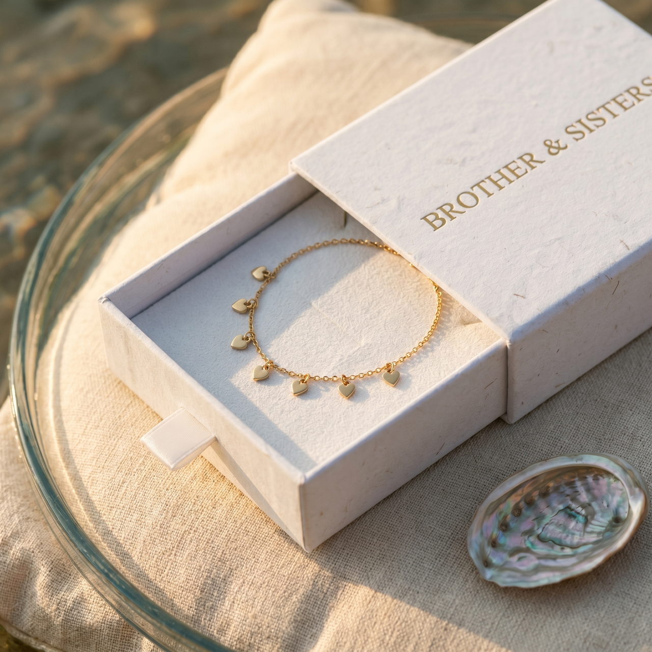 Tiny Heart Drop Anklet in elegant packaging by Brother & Sisters, showcasing ultra-dainty gold design.