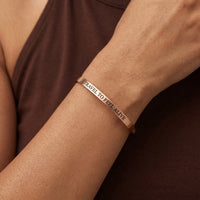 Thumbnail for Close-up of the Travel To Feel Alive bracelet in rose gold worn | SKU: ttfa-rg