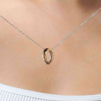 Thumbnail for Triple Name Necklace by Brother & Sisters, featuring intertwined gold and silver rings on a delicate chain.