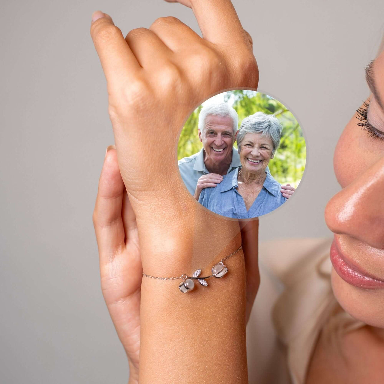 Tulip Photo Bracelet featuring a delicate tulip charm and hidden photo projection, by Brother & Sisters.